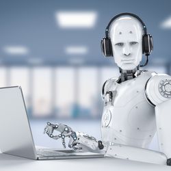 3D rendering of a white humanoid android typing on a laptop and wearing a headset, staring at the camera