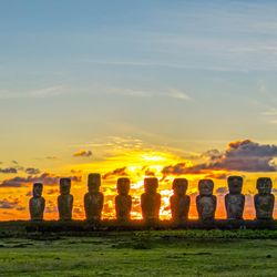 Dawn at Ahu Tongariki, Rapa Nui. New evidence shows they were constructed in between visits to South America, and by a steadily growing population, rather than an unsustainable surge.