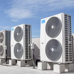 Air conditioning (HVAC) installed on the roof of industrial buildings.