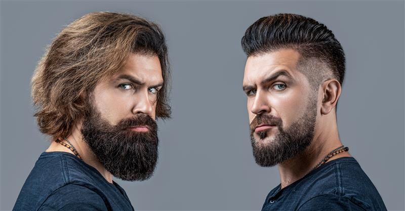 The photo shows the same man with hair and beard at different lengths. On the left, the man has medium length shaggy hair and a longer spade-shaped beard, and on the right the same man has shorter hair and his beard is trimmed and neater. He is wearing a blue t-shirt in both and he is looking at the camera with a raised eyebrow.