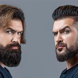 The photo shows the same man with hair and beard at different lengths. On the left, the man has medium length shaggy hair and a longer spade-shaped beard, and on the right the same man has shorter hair and his beard is trimmed and neater. He is wearing a blue t-shirt in both and he is looking at the camera with a raised eyebrow.