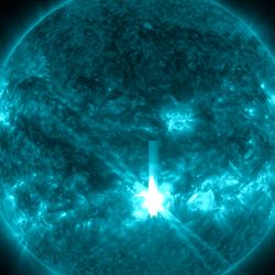 An ultraviolet view of the Sun. In the lower center a bright oversaturared spot of light is visible on the isk. The location of the flare. 