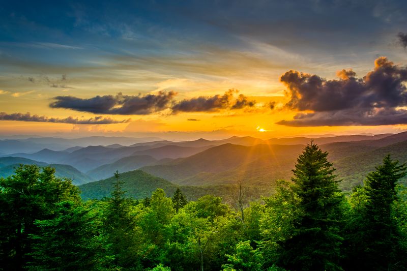 Sunset over the Appalachian Mountains from Caney Fork Overlook on the Blue Ridge Parkway in North Carolina.