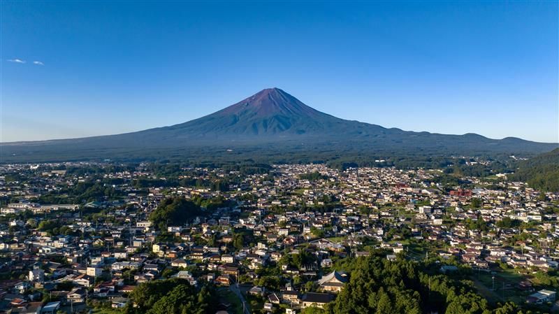 Japan’s iconic Mount Fuji, pictured without snow in summer, overlooks Fujikawaguchiko town.