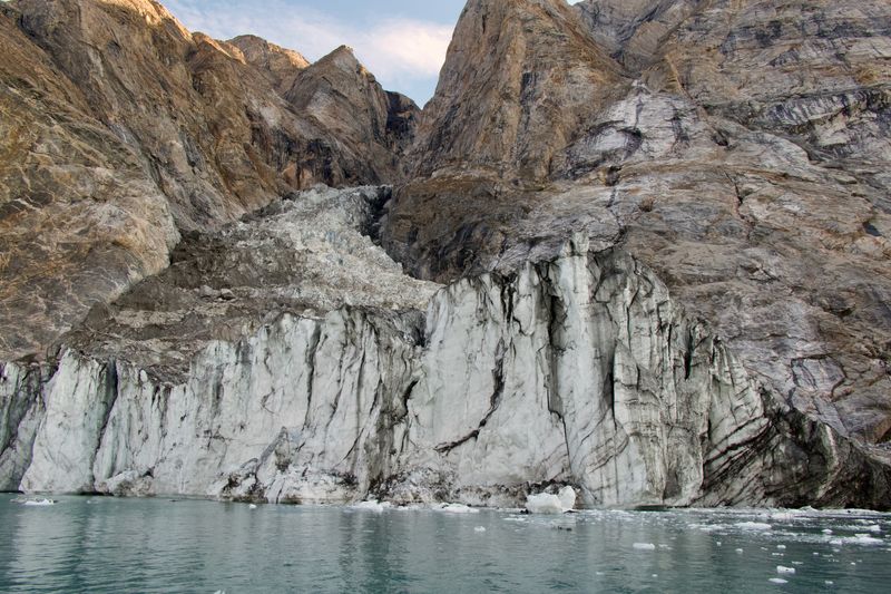 It looks like an ordinary glacier, but a month after this image was taken rock sliding down this slope produced one of the most remarkable events ever detected.