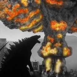 The image shows the silhouette of Godzilla standing in the middle of a city with towering skyscrapers either side. The monster has its head raise and mouth open and in the background a large mushroom cloud is visible. The mushroom cloud contains the only for of color in the image, as its structure is highlighted with flames. 