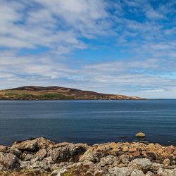 Gruinard island, seen on the left, pictured from a safe distance in the Inner Hebrides of western Scotland.