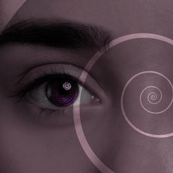 eyes with purple circles in the irises superimposed with a spiral to signify entering a hypnotic state