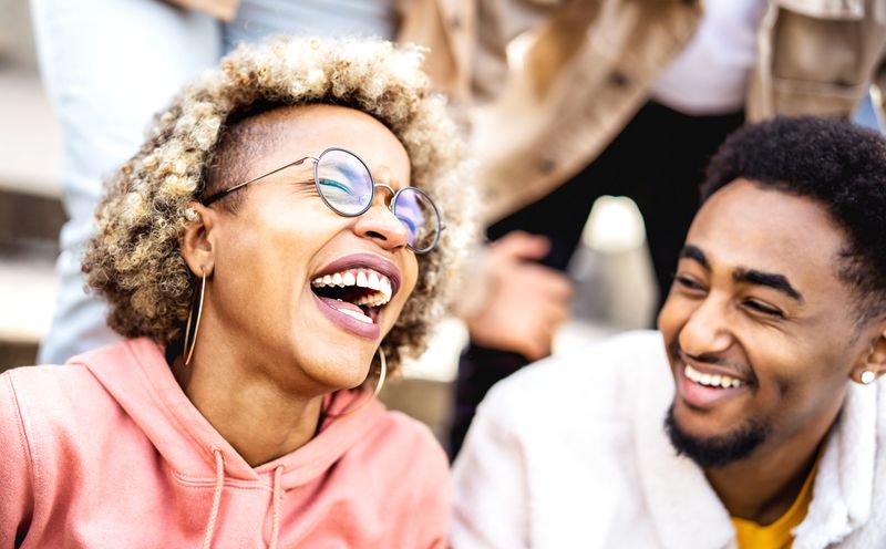 Man and woman laughing