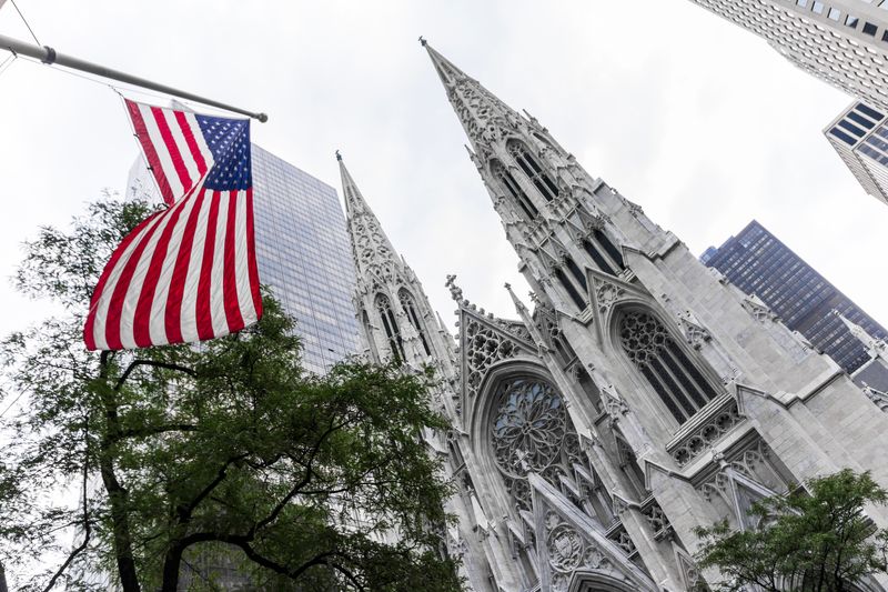 The Cathedral of St. Patrick, a decorated Neo-Gothic-style Roman Catholic cathedral church in the United States and a prominent landmark of the Fifth Avenue in Manhattan, NYC