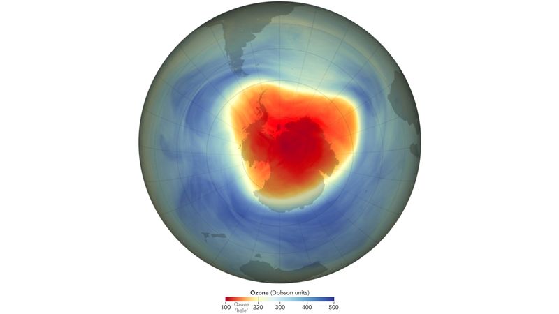 The ozone hole is red and roughly traingular covering the whole antarctic continent while the rest of the ozone coverage is pretty healthy