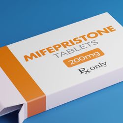 Packet of mifepristone on a blue background