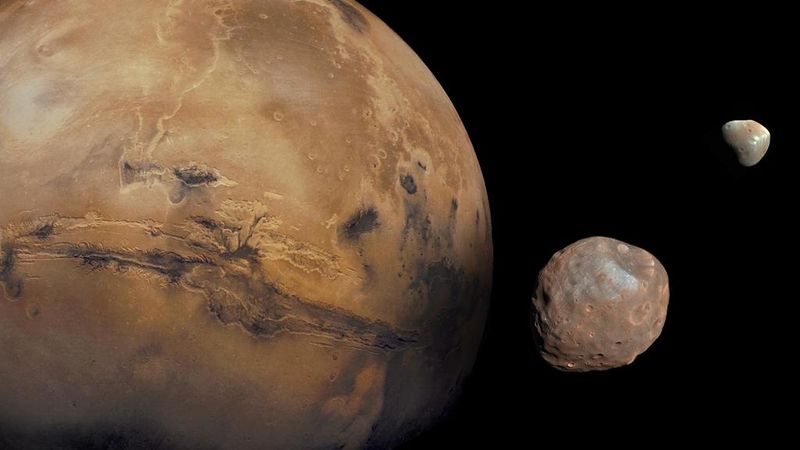 Image of Mars with its moons, Phobos and Deimos