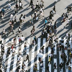 Crowds of people at Shibuya Crossing in Japan.