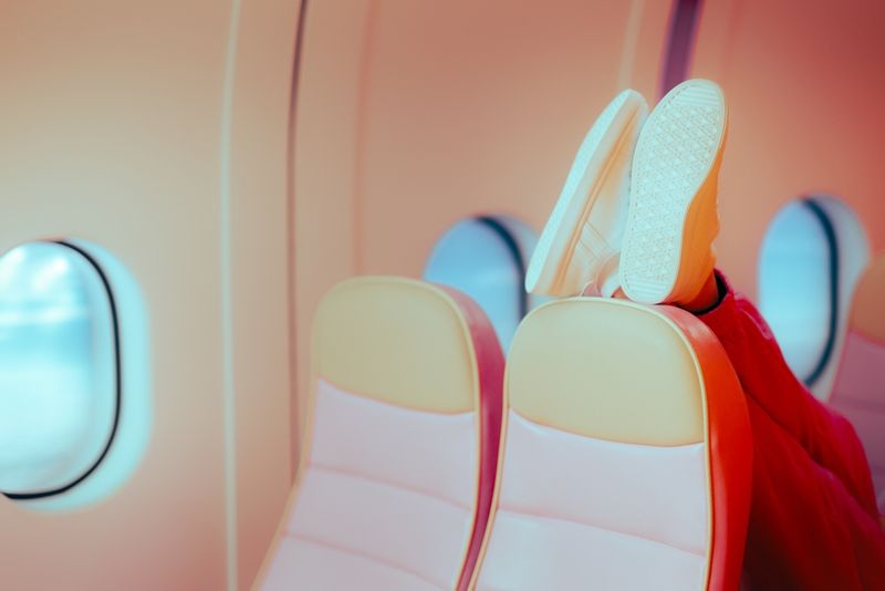 Shoes on a chair in the plane.