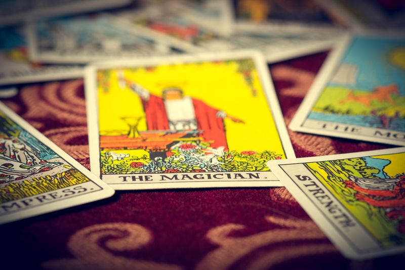 Tarot cards spread out on a table 