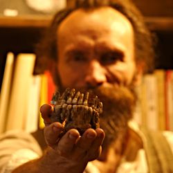 Ludovic Slimak, co-first author and discoverer of Thorin, hold the maxillar of the mysterious Neanderthal. 