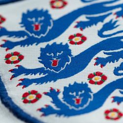 close up of three lions badge from an England football shirt