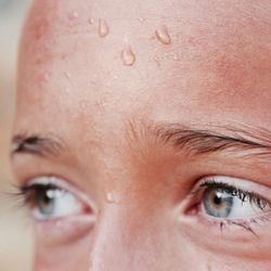 Young girl with sweat on her brow