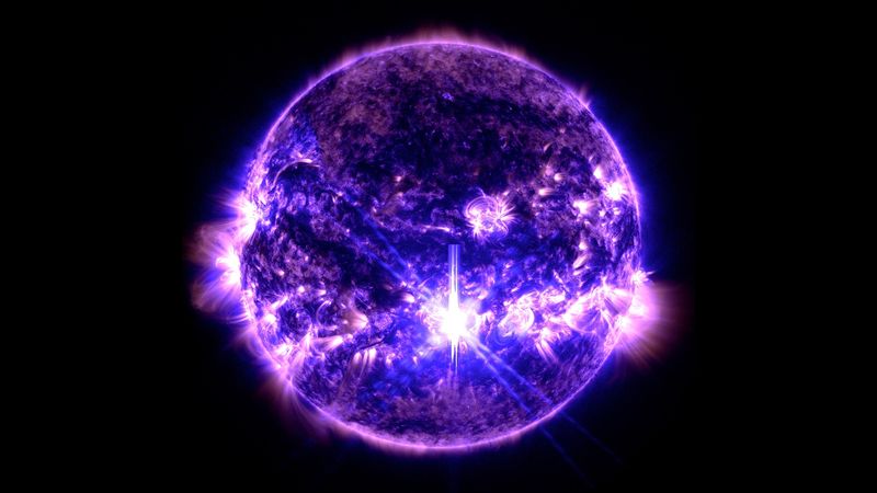 NASA’s Solar Dynamics Observatory captured the largest solar flare of solar cycle 25 yet – an X.90 flare seen as the bright flash in the center – on October 3, 2024.  