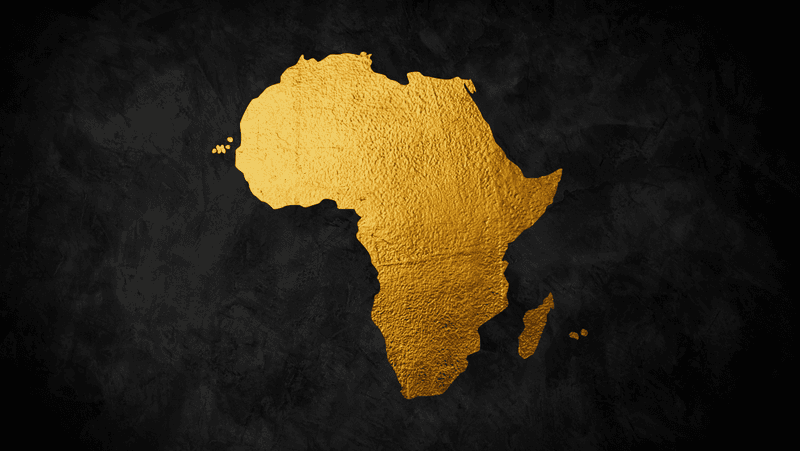 african continent shown as gold foil on black card