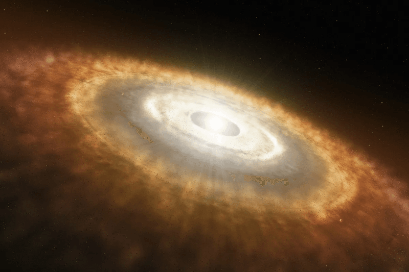 Artist’s impression of a young star surrounded by a protoplanetary disk. When nuclear fusion first ignited in our Sun’s central core, our Solar System may have looked very similar to this.