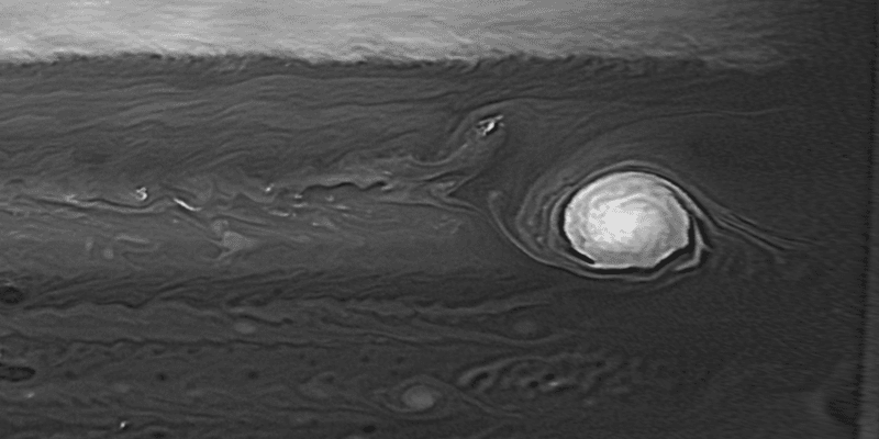 The GRS looks very bright and white in this black and white infrared view of jupiter equatorial plane