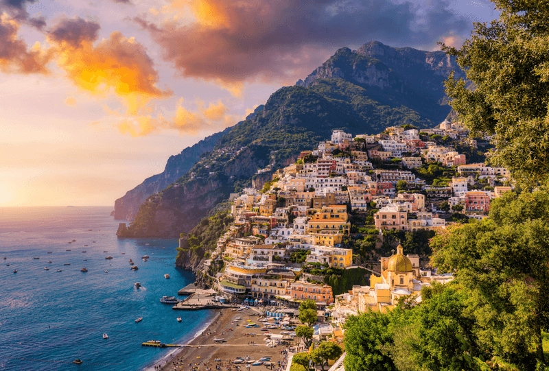 The Almalfi coat of Italy along the Mediterranean Sea, with beautiful architecture and sunset.