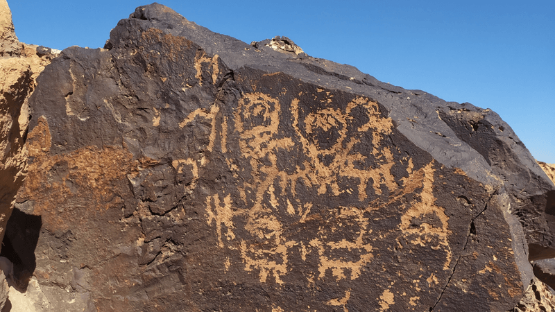 petroglyphs on a rock in the negev desert