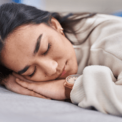 Person sleeping with watch