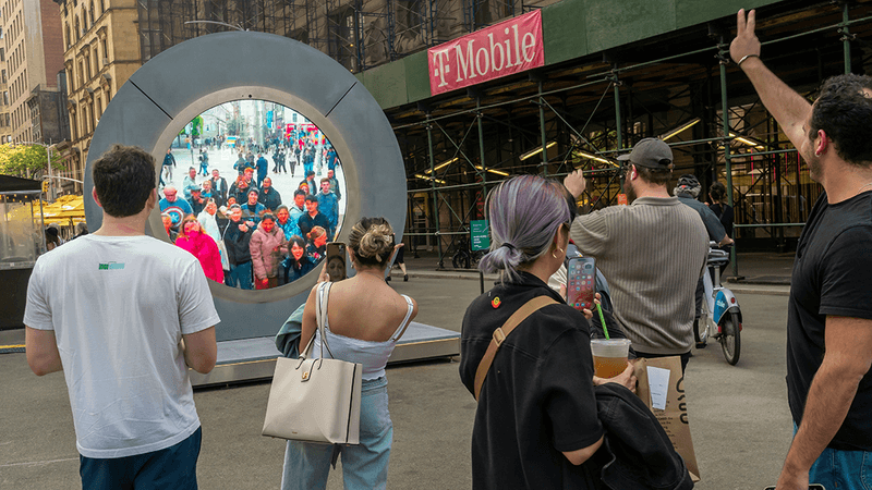 A circular screen in Dublin showing video from New York.