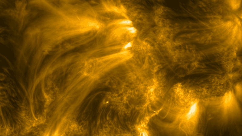 A close up look at the swirling plasma and fibers that make up the corona of the sun 