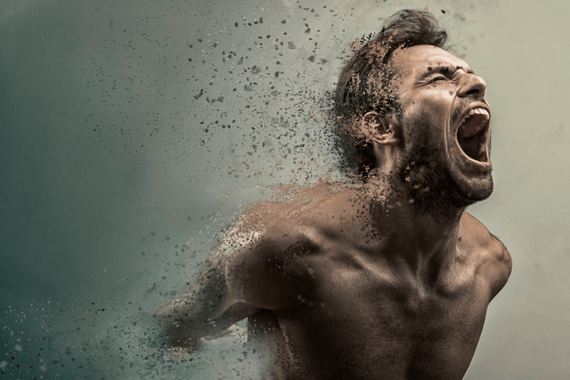 Screaming man disintegrating into dust, arms-first, on a grey and brown background