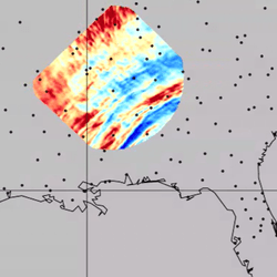 A map of the united states and on a small portion the data from the satellite. concetric bands of red and blue are visible