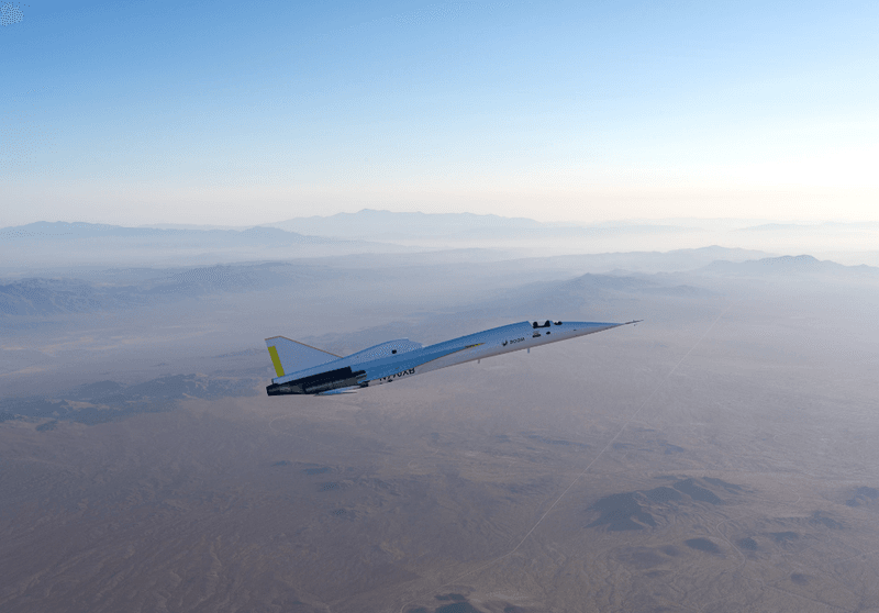 The experimental XB-1 plane flies over the Mojave Desert, California, USA.